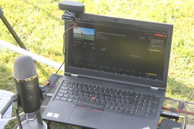 YouTube stream running. The same laptop was used to receive and decode the DVB-S1 transmission from the balloon using the affordable Nooelec NESDR SMArt USB stick (RTL-SDR). (photo by OH1ON)
